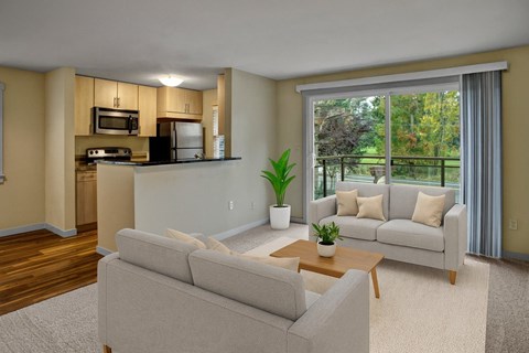 A modern living room with a grey sofa and a coffee table.