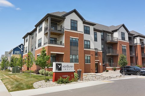 Apartment complex with a sign that says van Buren West.