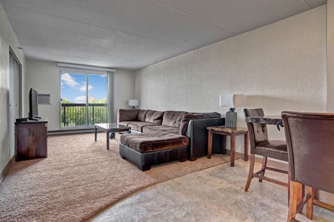 a living room with a couch and a table