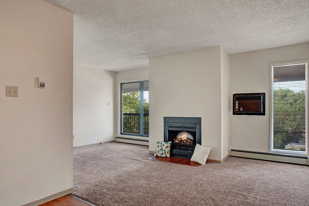 Madison Park Apartment Homes Living Room Fireplace Apartments for rent in Regina, SK