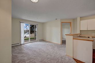 Manning Crossing Living Room and Balcony Apartments for rent in Edmonton, AB