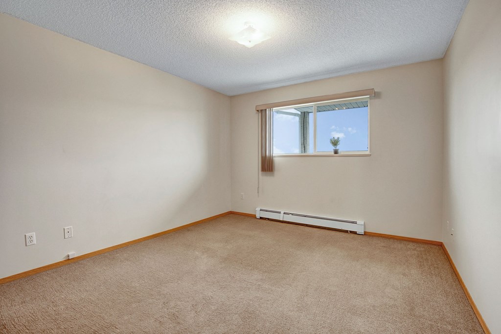 Bedroom in the Breeze floorplan at Westhaven Estates Apartments for rent in Lethbridge, AB