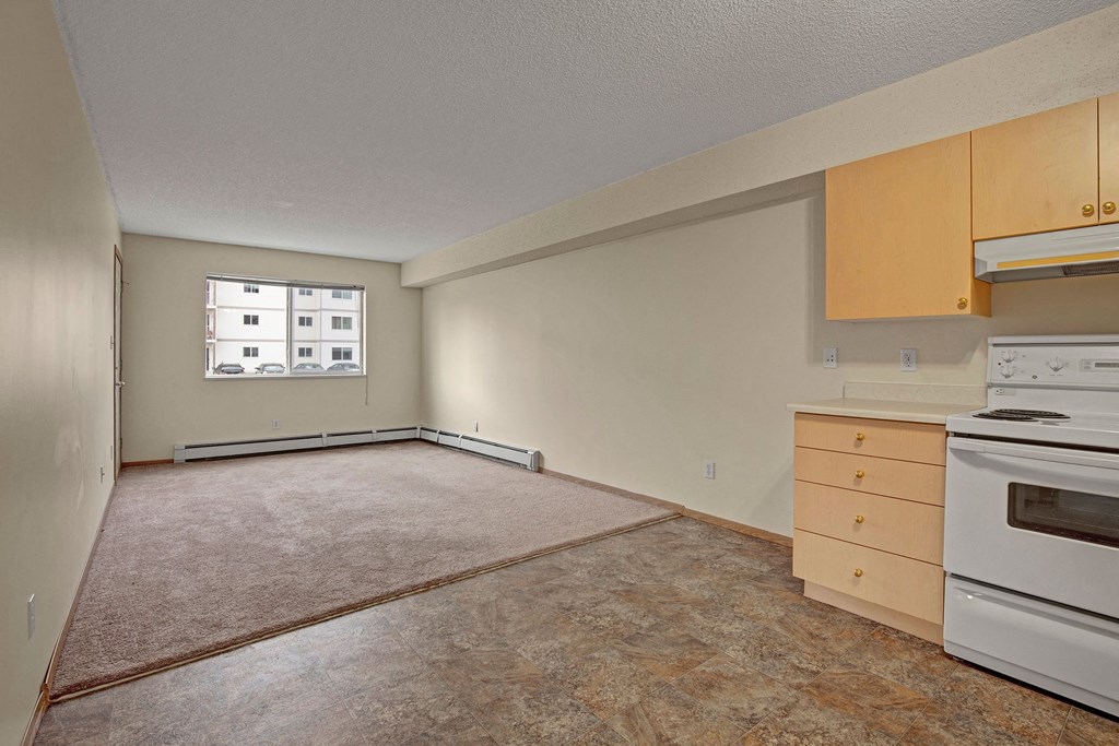 Living Room in the Woodhurst Floor Plan at Westhaven Estates Apartments for rent in Lethbridge, AB