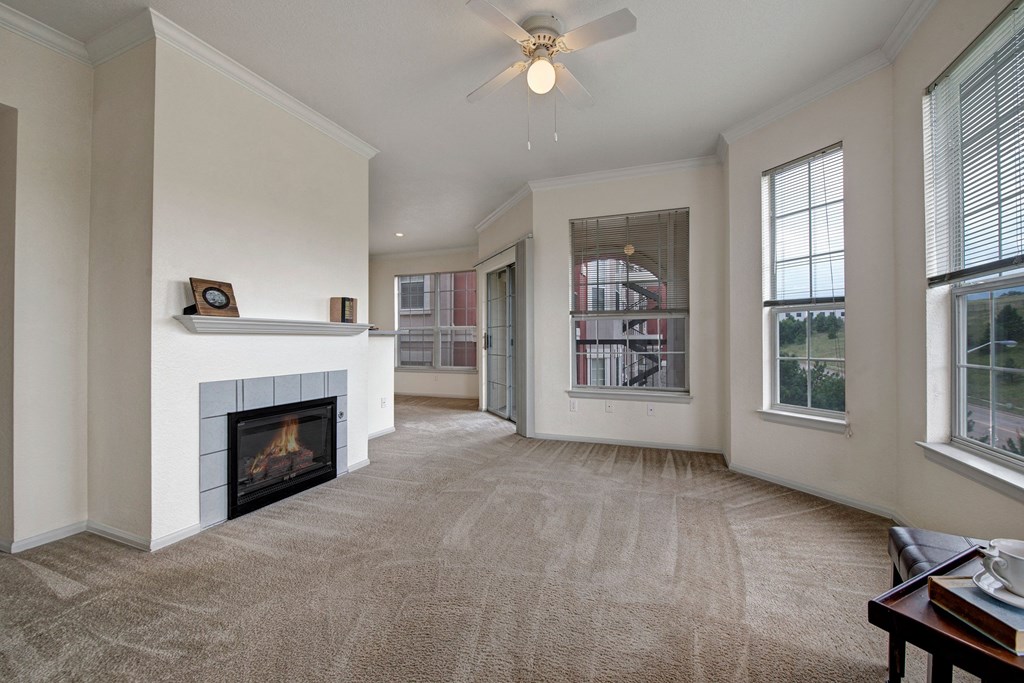 Camelback Pointe Living Room Fireplace Apartments in Colorado Springs, CO