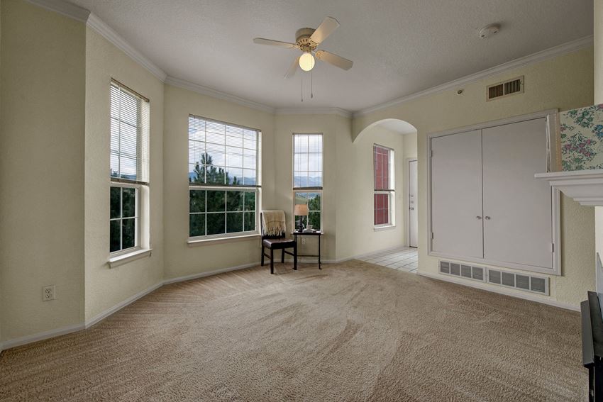 Camelback Pointe Living Room With Large Windows Camelback Pointe Living Room Windows Apartments in Colorado Springs, CO