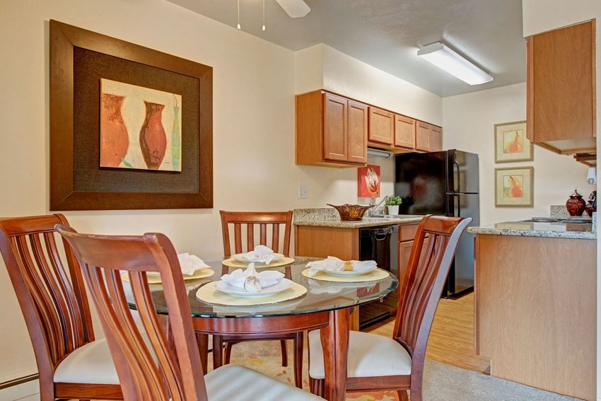 Copper Stone Dining Table & Kitchen Copper Stone Dining Room Kitchen Apartments in Colorado Springs, CO