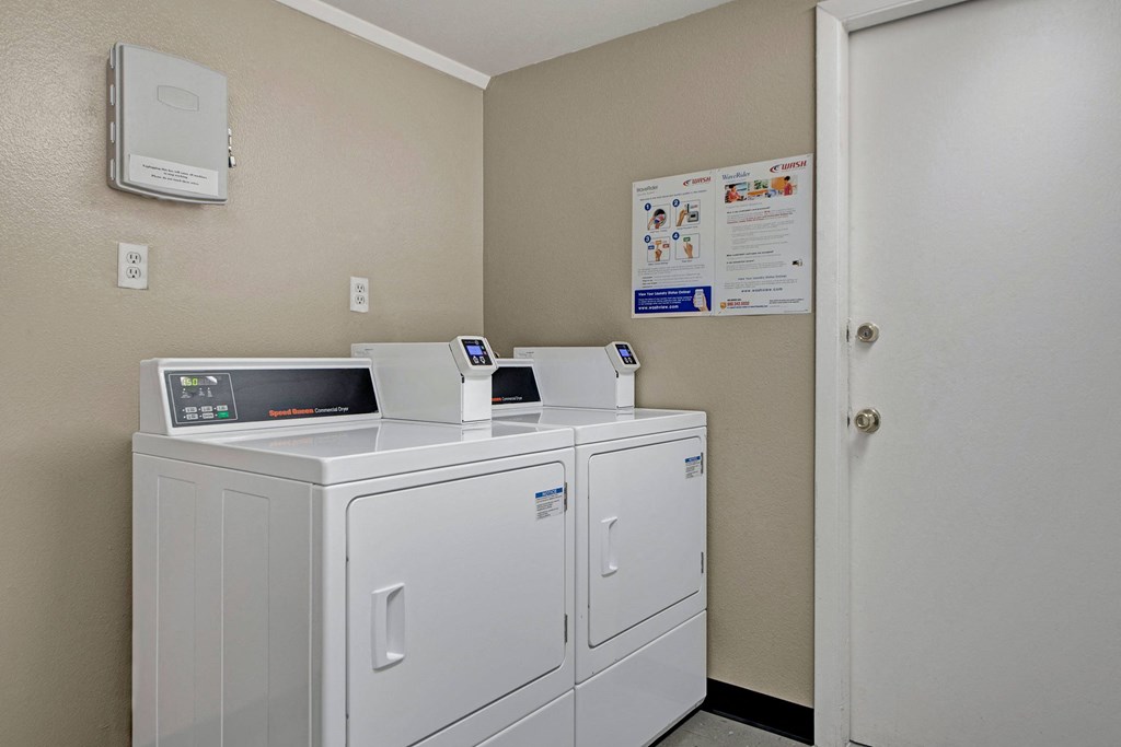 Hyde Park laundry room on site Apartments in Colorado Springs, CO