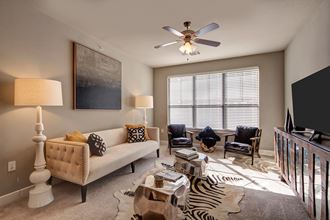 Ceiling Fans and Large Windows for a Light and Airy Feel Enclave at Brookside Living Room
