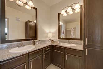 Double Vanities and Granite Countertops in the Master Bathroom Liberty Pointe Master Bathroom - Photo Gallery