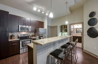 Cityplace Heights kitchen and seating area
