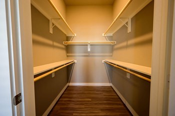 Harmony Luxury Apartments walk in closet with tall ceilings - Photo Gallery 12