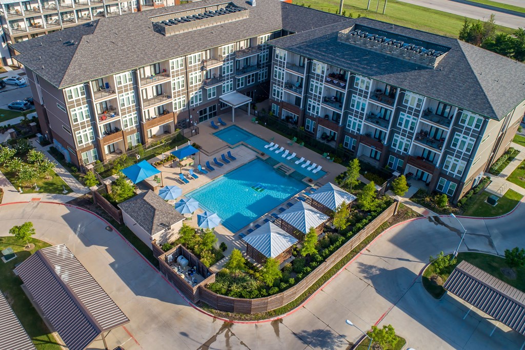 Harmony Luxury Apartments outdoor view with pool Apartments for rent Rowlett, TX 75089