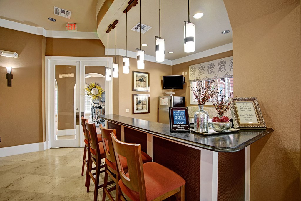 The Palms at Briarwood Resident Lounge Fireplace Apartment near Odessa, TX