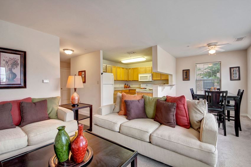 A cozy living room with easy access to the kitchen Reserve at Abilene Living Room Apartments in Abilene