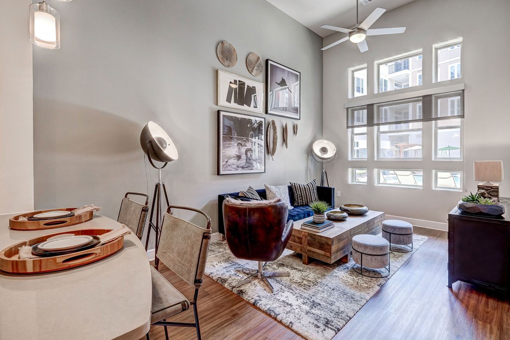 Waterford Market Apartments living room with tall ceilings, ceilings fan and good lighting Apartments near Dallas, TX