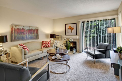 a living room with a couch and a table