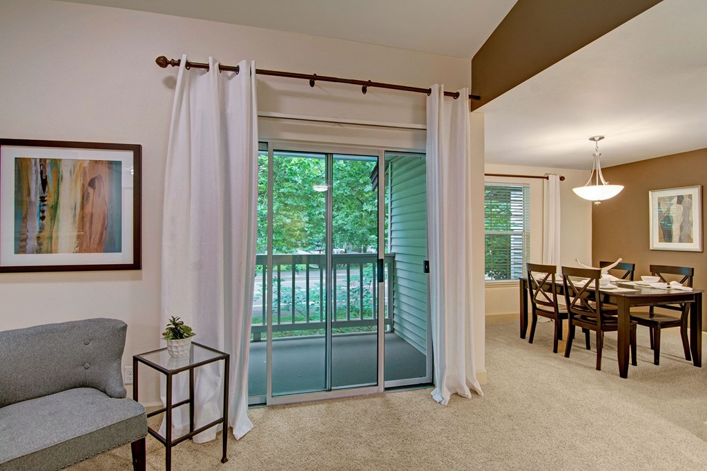 Island Park living room and balcony Apartments in Kent, WA