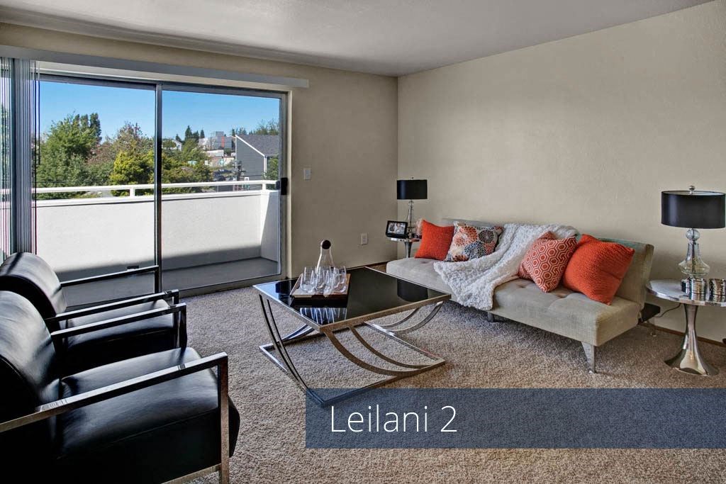 Leilani 2 living room and balcony Apartments in Seattle, WA