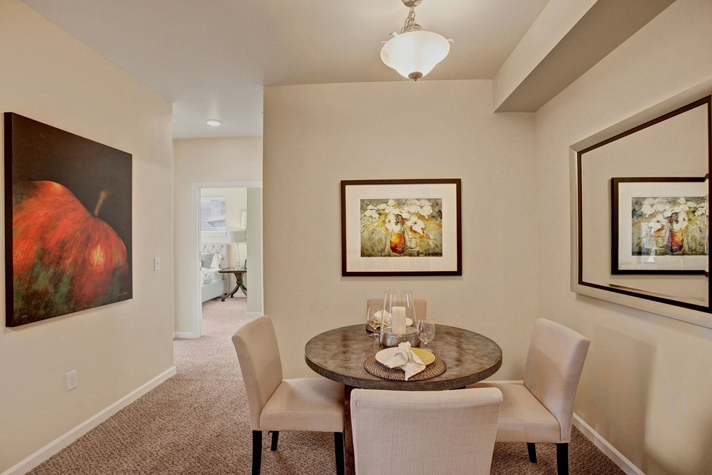 A cozy dining area with overhead lighting and easy access to the kitchen Solara Dining Apartments in Moses Lake, WA