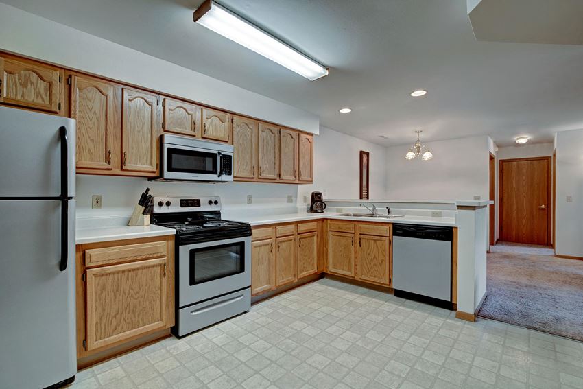 Arbor Ridge Kitchen View with Fridge, Oven, Microwave and Dishwasher Arbor Ridge Kitchen View, Dean Weidner Real Estate Apartments for rent Milwaukee, WI
