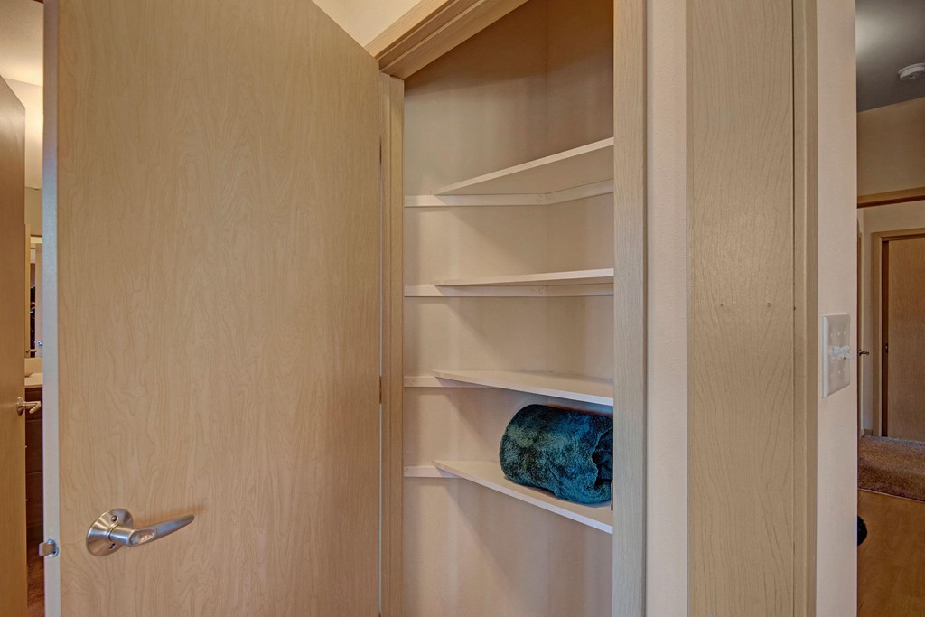 Unit Linen Closet at The Vue at Pinnacle Peak Apartment Homes Apartments in Fitchburg, WI
