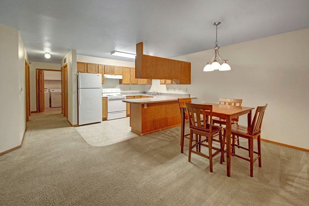 Kitchen and Dining Room at Dakota Apartments. Apartments for rent in Stanley, ND