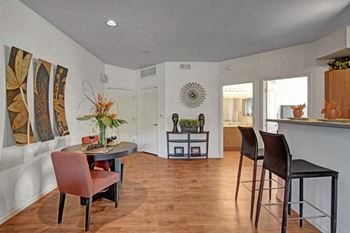 Acclaim Apartments- furnished dining room/kitchen area 