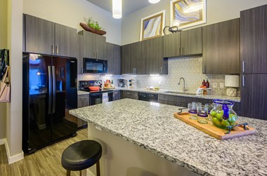 Harmony Luxury full size kitchen with granite countertops