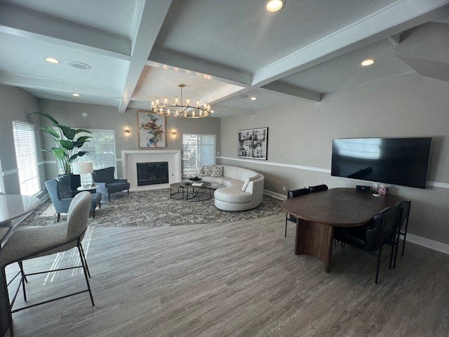 a living room with a tv and a table