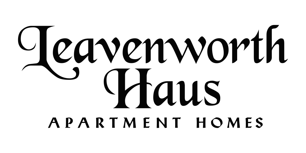a black and white image of a house with the words leavenworth haus written on