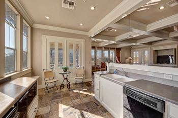 a kitchen with a sink and a dishwasher