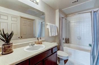 Bathrooms with garden tubs and curved shower curtain rods