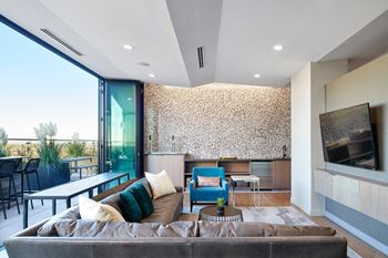 a living room with a couch and a table