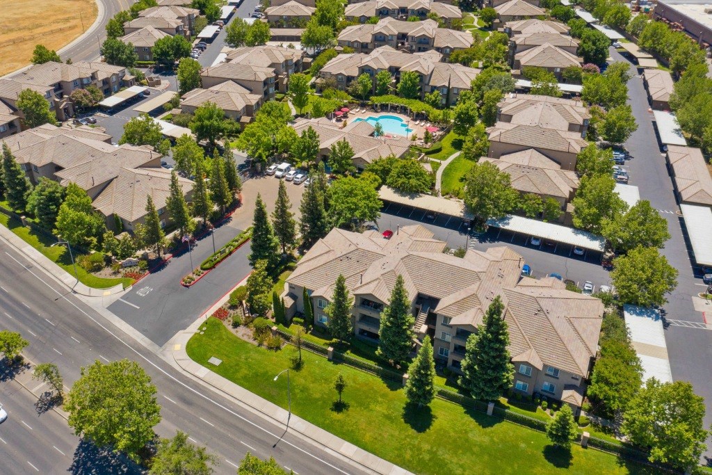 an aerial view of a neighborhood of houses in a suburb