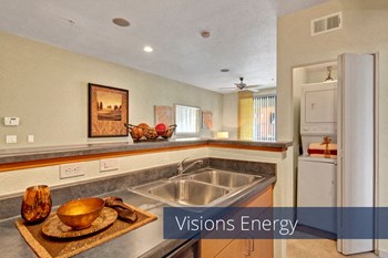 A kitchen with a view into the living room Visions Kitchen - Photo Gallery 6