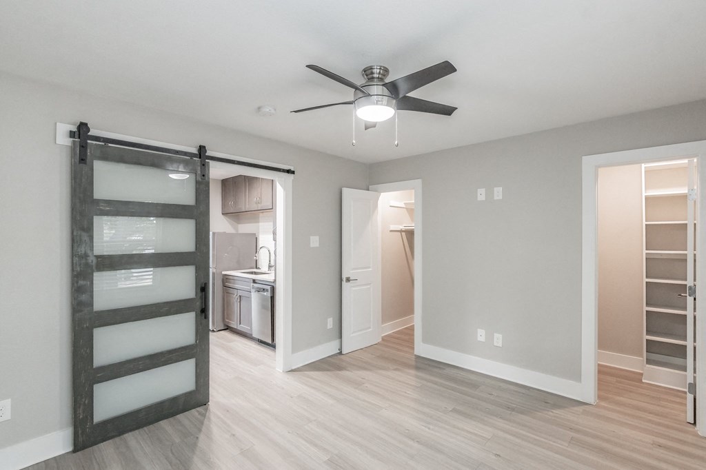 Bedroom with sliding barn house door