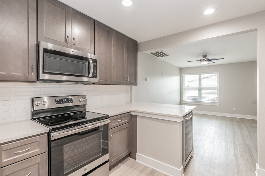 Kitchen breakfast bar with granite countertops