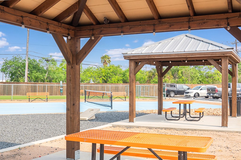 Covered picnic gazebos with tables at Towne Oaks Apartments