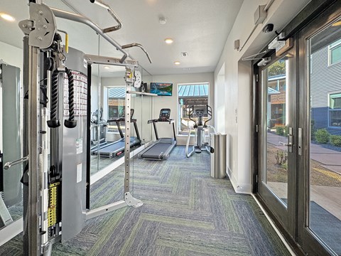 24-hour fitness center with cardio and strength equipment at Reserve on Abrams
