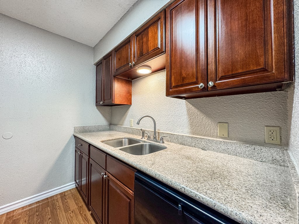 Kitchen countertops with dark cabinets – Borders Apartments Brownsville TX