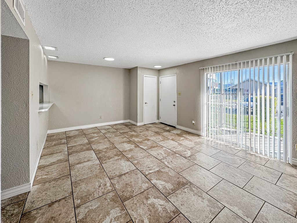 Large dining room with tile flooring – Borders Apartments Brownsville TX