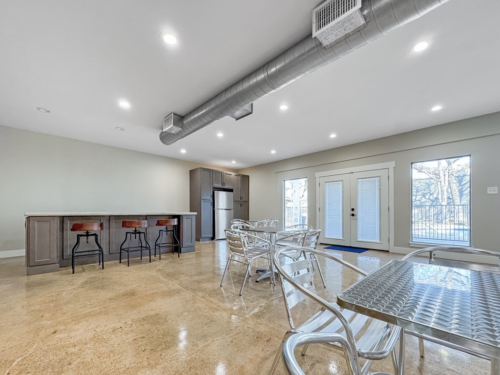 Clubhouse seating area with modern décor and polished flooring