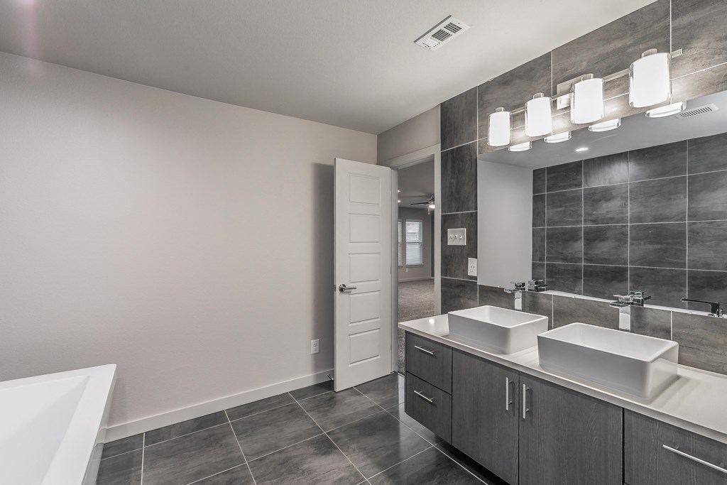 Bath with double sink