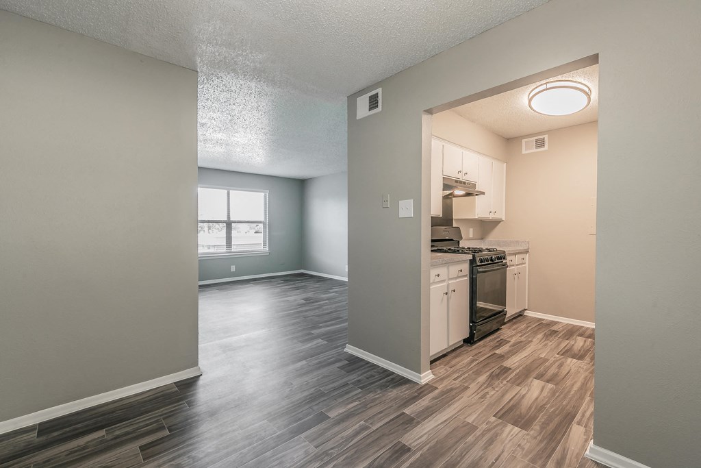 Dining area with plank flooring and open-concept layout