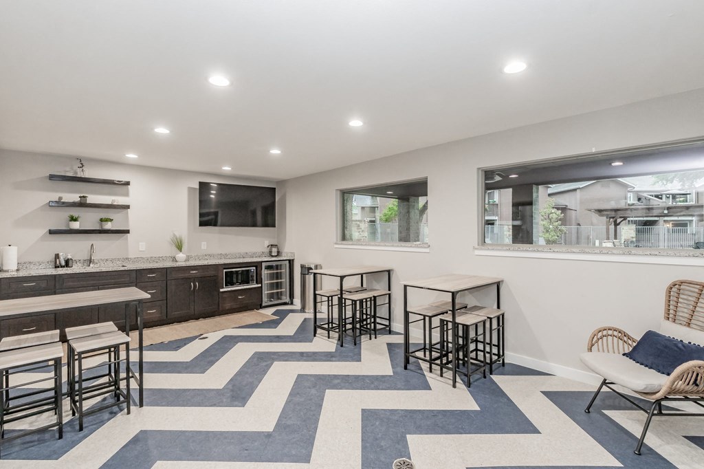 Clubhouse lounge with bar area and seating