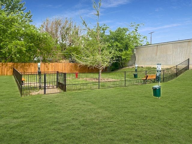 Fenced bark park for residents and pets at Davis Park Apartments