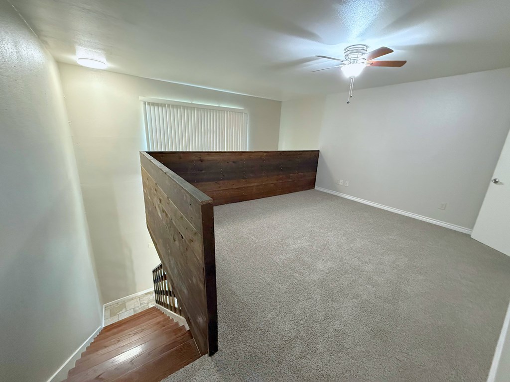 Large loft bedroom at Sierra Ranch Apartments in San Antonio, TX.