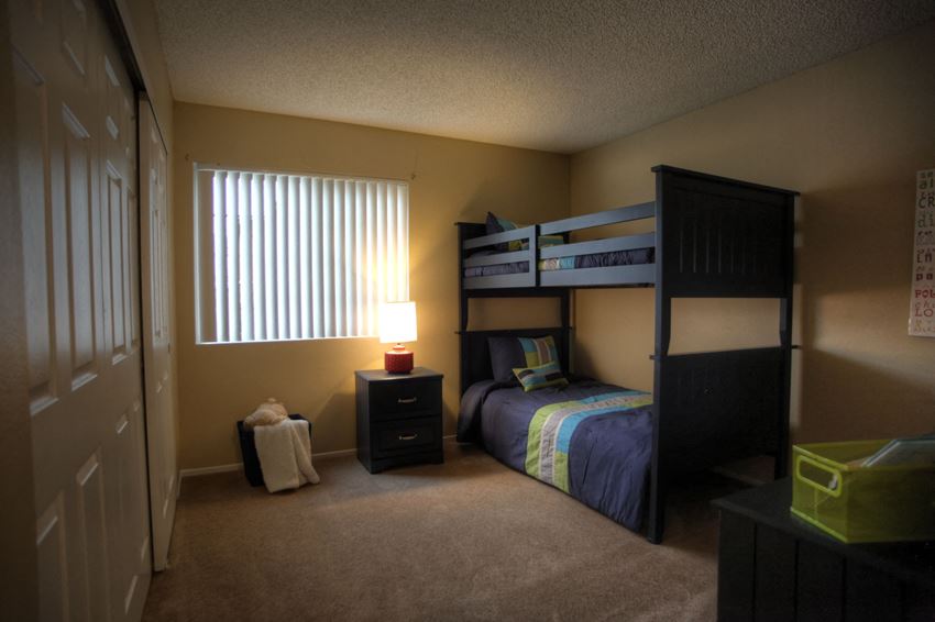 Small Bedroom With Expansive Window Small Bedroom With Expansive Window at Raintree Apartments, CA 92346