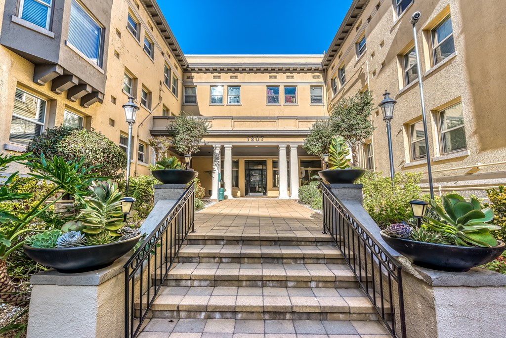 an image of the front of the building with stairs leading up to the entrance