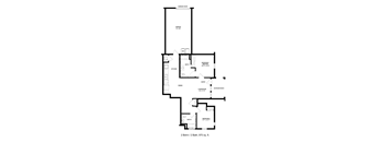 A floor plan of a house with a garage door, kitchen, dining area, living room, two bathrooms and an outdoor deck.